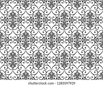 Floral pattern. Vintage wallpaper in the Baroque style. Seamless vector background. White and black ornament for fabric, wallpaper, packaging. Ornate Damask flower ornament