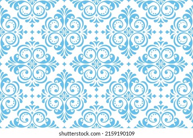 Floral pattern. Vintage wallpaper in the Baroque style. Seamless vector background. White and blue ornament for fabric, wallpaper, packaging. Ornate Damask flower ornament