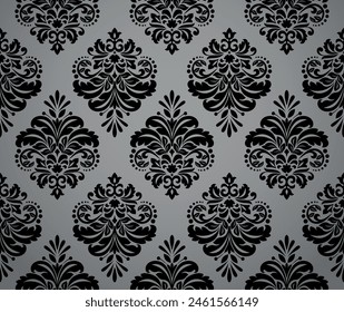 Floral pattern. Vintage wallpaper in the Baroque style. Seamless vector background. Gray and black ornament for fabric, wallpaper, packaging. Ornate Damask flower ornament