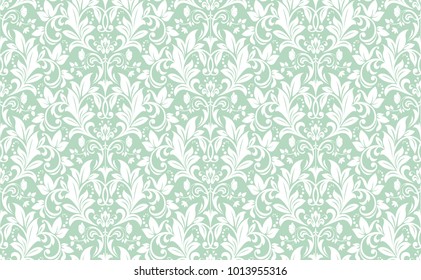 Floral pattern. Wallpaper baroque, damask. Seamless vector background. Green and white ornament.