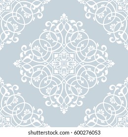 Floral pattern. Wallpaper baroque, damask. Seamless vector background. Blue and white ornament.