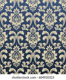 Floral Pattern. Wallpaper Baroque, Damask. Seamless Vector Background. Gold And Dark Blue Ornament