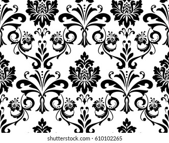 Floral pattern. Wallpaper baroque, damask. Seamless vector background. White and black ornament. Graphic modern pattern.