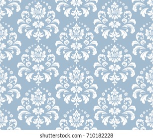 Floral pattern. Wallpaper baroque, damask. Seamless vector background. Blue and white ornament