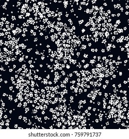 Floral pattern.Printing with small white flowers. Seamless vector texture. 