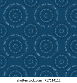 Floral Patterns on blue background. Circle leaf ornament. 
 Abstract motif. Ethnic motif. 
Fashionable decorative design