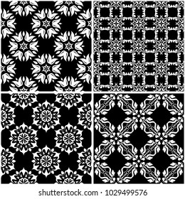 Floral patterns. Set of black and white monochrome seamless backgrounds. Vector illustration