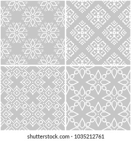 Floral patterns. Set of gray and white monochrome seamless backgrounds. Vector illustration