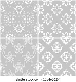 Floral patterns. Set of gray and white monochrome seamless backgrounds. Vector illustration