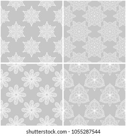 Floral patterns. Set of gray and white monochrome seamless backgrounds. Vector illustration