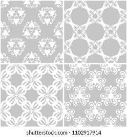 Floral patterns. Set of gray and white monochrome seamless backgrounds. Vector illustration