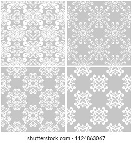 Floral patterns. Set of gray and white monochrome seamless backgrounds. Vector illustration