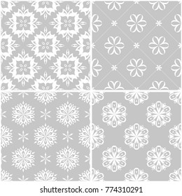 Floral patterns. Set of gray and white monochrome seamless backgrounds. Vector illustration