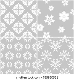 Floral patterns. Set of gray and white seamless backgrounds