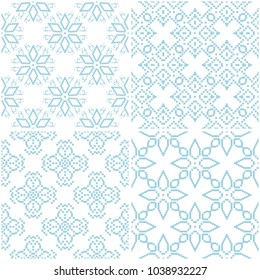 Floral patterns. Set of light blue elements on white. Seamless backgrounds. Vector illustration