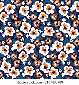 Floral print with decorative rustic meadow. Seamless pattern, folk botanical background with small hand-drawn flowers, leaves on a dark blue field. Simple flower surface design in three colors. Vector