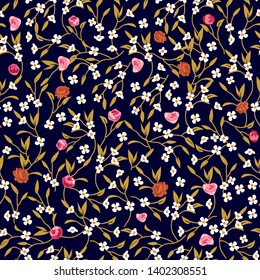 Floral print with small wildflowers. Seamless vector pattern with summer garden roses and daisies on black background. Retro textile collection.