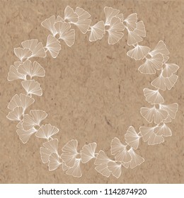 Floral round frame with ginkgo biloba on kraft paper. Vector illustration with place for text.  Greeting card, invitation or isolated elements for design.