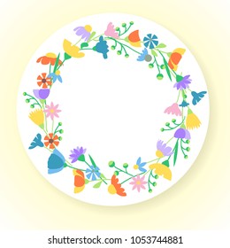 Floral round frame of a wild flowers. Vector illustration