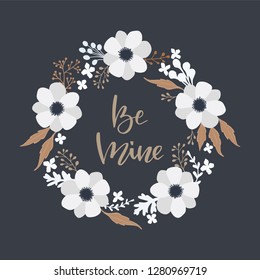 Floral round wreath frame with Be Mine calligraphy. 
