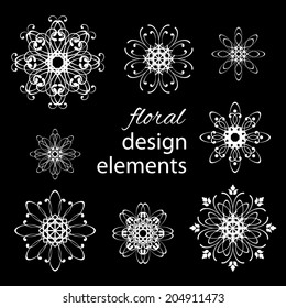 Floral rounded white design elements set collections isolated on black background. Vector illustration. 