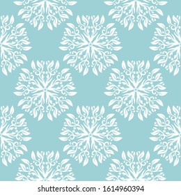 Floral seamless background. White pattern on blue backdrop. Vector illustration