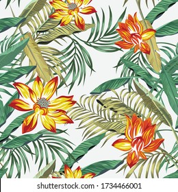 Floral seamless illustration, realistic vector pattern green palm, fern leaves and sunny orange lily, lotus flowers on the white background