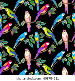 Floral seamless jungle pattern with parrots and leaves of tropical plants.
