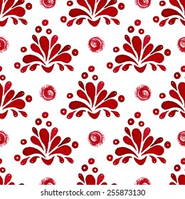 Floral seamless pattern. Abstract floral red shapes, paisley, drops and small circles on a white background. 
