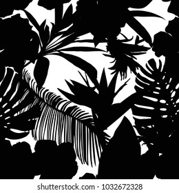 Floral seamless pattern. Background with isolated black silhouettes of hand drawn tropical flowers and leaves on white background. Design for invitation, prints and cards. Vector illustration.