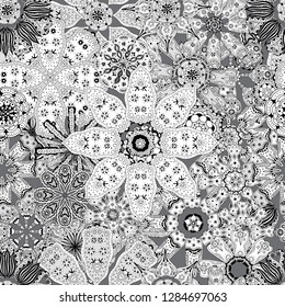 Floral seamless pattern background with leaves. Doodles ornament