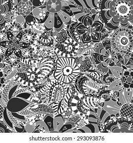 Floral seamless pattern background with leaves. Doodles ornament