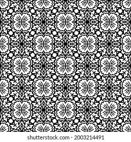 floral seamless pattern background.Geometric ornament for wallpapers and backgrounds. Black and white 

pattern. 