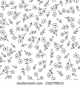 Floral seamless pattern. Black flowers on white background