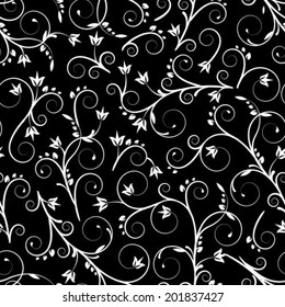 Floral seamless pattern with black and white flowers 