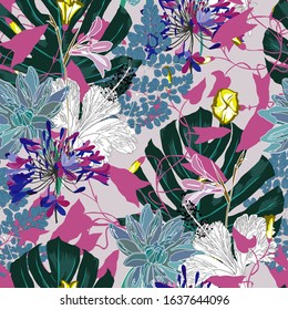 Floral seamless  pattern with bright tropical leaves and exotic flowers. Abstract background texture.