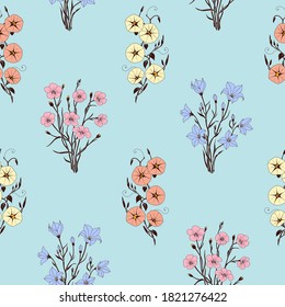Patrón floral sin costuras para tela con flores silvestres sobre un fondo azul.