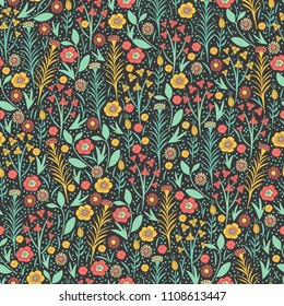 Floral seamless pattern. Field of wild flowers. Hand drawn vector illustration.