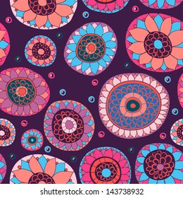 Floral seamless pattern with flowers. Copy square to the side and you'll get seamlessly tiling pattern which gives the resulting image ability to be repeated or tiled without visible seams.