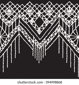 Floral seamless pattern with a fringe border knitted or woven macrame in boho style