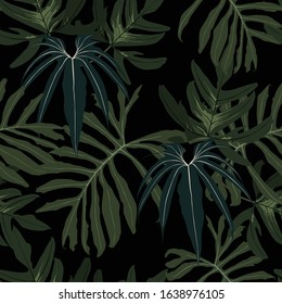 Floral seamless pattern, green, black and white tropical leaves plant with on black background, vintage theme.