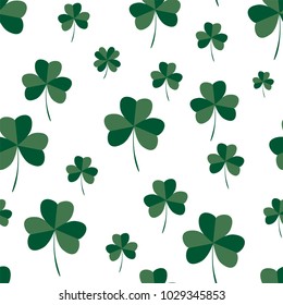 Floral seamless pattern with a green clover on a white background. St.Patrick 's Day. Vector.