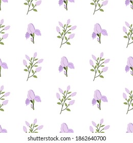 Floral seamless pattern with green leaves, lilac branch, iris blossom. Textile, fabric ornament. Spring bloom flowers.