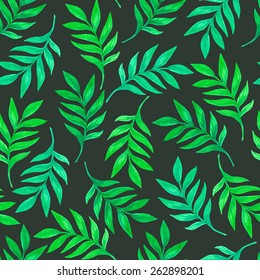 Floral seamless pattern with green leaves and branches. Vectorized watercolor drawing.