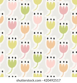 Floral seamless pattern in green, pink and orange on cream background.