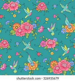 Floral seamless pattern. Hummingbirds fly among the flowers on green background