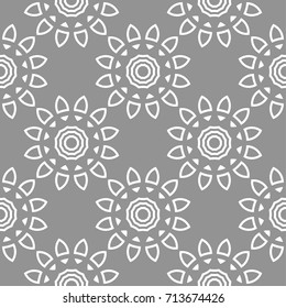 Floral seamless pattern. Light gray background with flower elements for wallpapers and textile