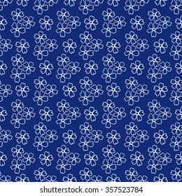 Floral seamless pattern. Lovely daisies on a blue background, graphic, hand drawn, vector. For the design and decoration background, wallpaper, packaging, fabrics, textiles.