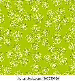 Floral seamless pattern. Lovely daisies on a green background, graphic, hand drawn, vector. For the design and decoration background, wallpaper, packaging, fabrics, textiles.