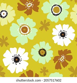 Floral seamless pattern made of blossom meadow daisies. Large flower buds. Hand drawn botanical background in trendy flat design. Cartoon style. Nature motif and retro design.